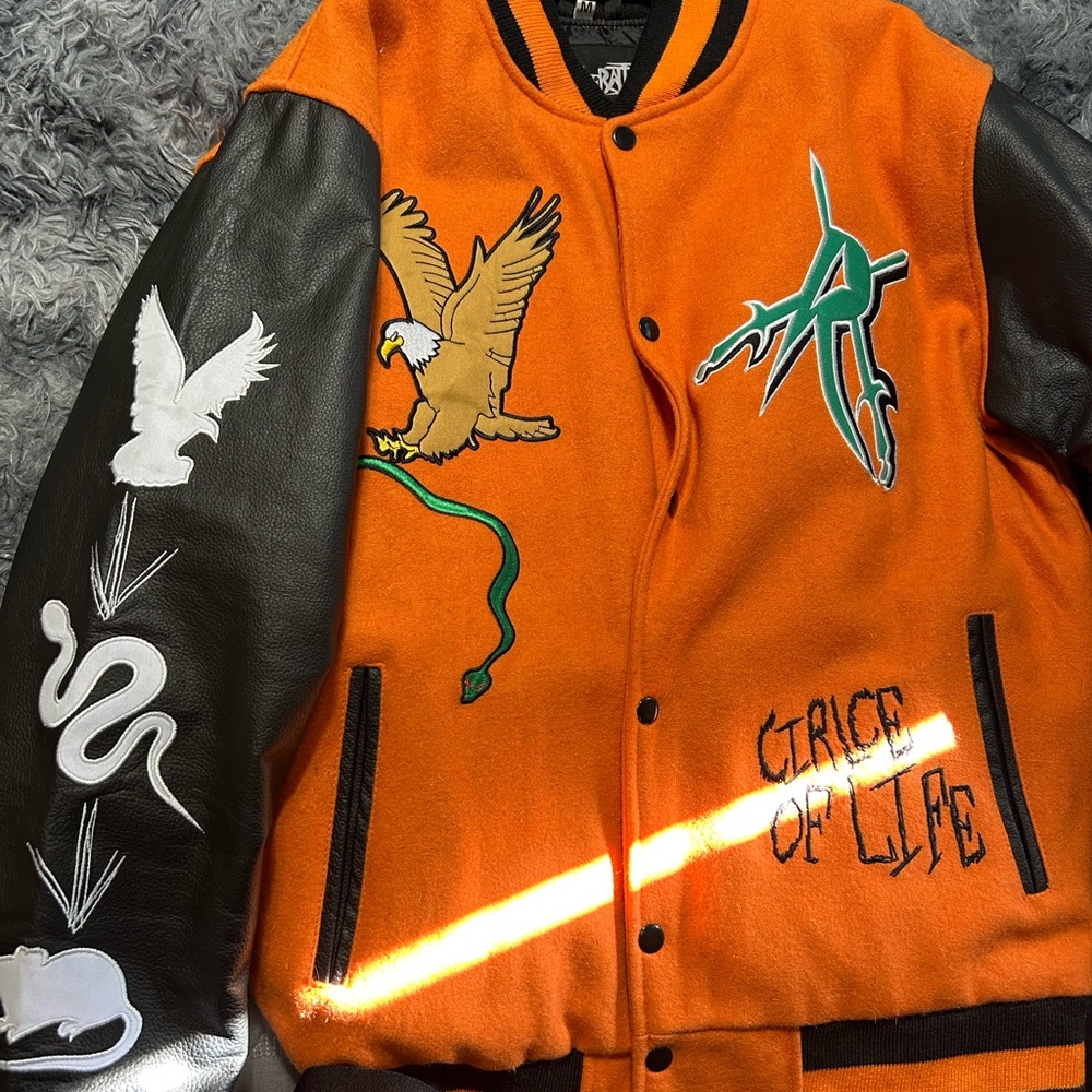 Orange Varsity Jacket with Eagle and Snake Patches
